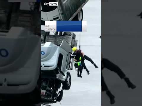 Kentucky: View from driver's cabin hanging from bridge over Ohio River following collision