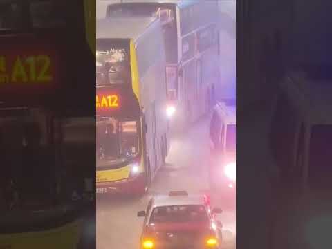 Heavy rain in Hong Kong leaves streets and buildings flooded as woman seen getting washed down road