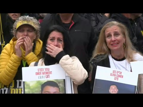 Israelis react in Hostages Square as two hostages handed over to the Red Cross in Gaza's Rafah | AFP