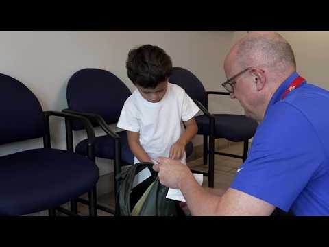 Ralston Public Schools hands out free backpacks for the new school year