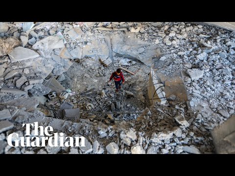 Residents of Rafah assess damage after Israeli airstrike in Gaza