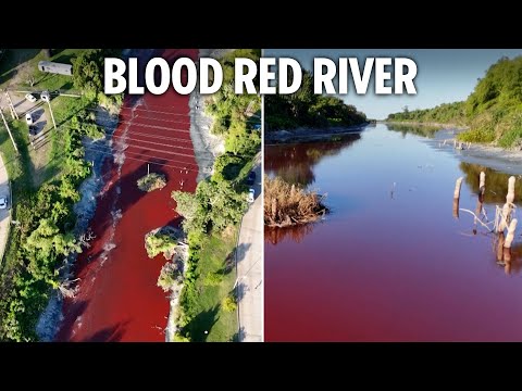 Shock as river mysteriously turns BLOOD RED leaving locals baffled