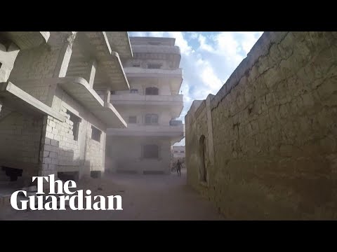 Syrian forces attack rebel-held regions after strike on military graduates