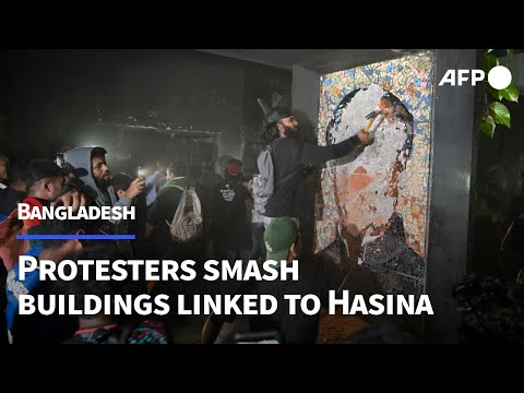 Bangladesh protesters raze buildings linked to ousted leader Sheikh Hasina | AFP