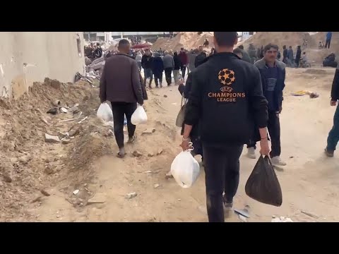 Gaza City residents welcome delivery of desperately-needed humanitarian relief supplies