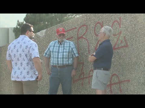 Golden memorial spray-painted with Gaza war message