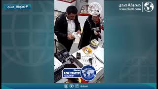 خفة يد رجل مع بائعة وسرقتها