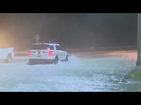 Hurricane Helene storm surge washing over coastal roads in Key West