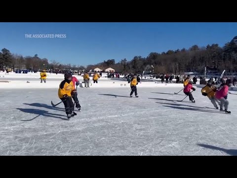 Pond hockey in New Hampshire brightens winter for hundreds but is under threat from climate change