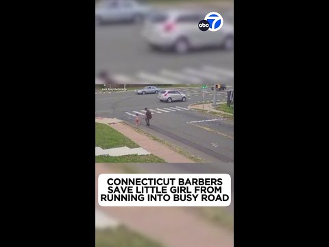 Barbers save little girl from running into busy intersection