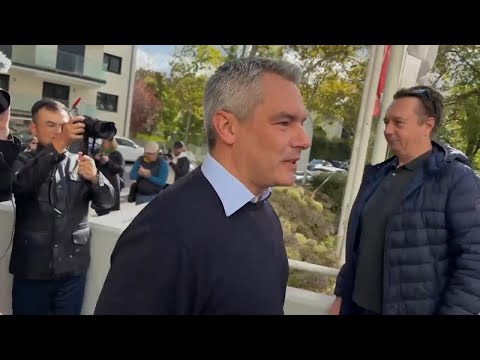 Austrian Chancellor Nehammer arrives to vote in tight national election