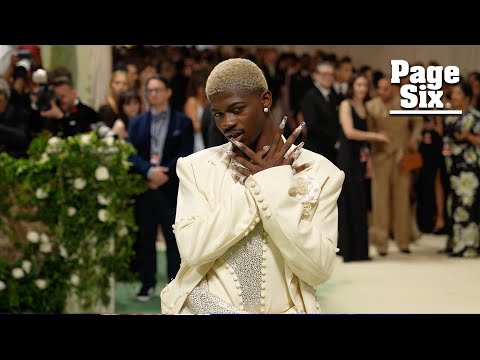 Blond Lil Nas X sports glittering jumpsuit on the 2024 Met Gala red carpet