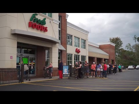 People line up outside North Carolina grocery store post Helene