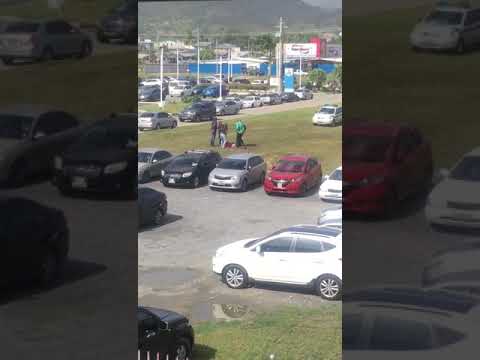 TTPS at RBL Trincity, car was parked outside waiting to rob ppl leaving the bank Part 1