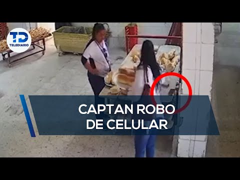 Captan a mujer robando celular en panadería