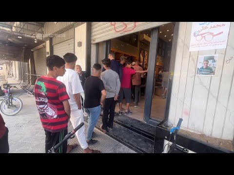 Desperate Palestinians queue for bread at bakery in Gaza City amid famine warning