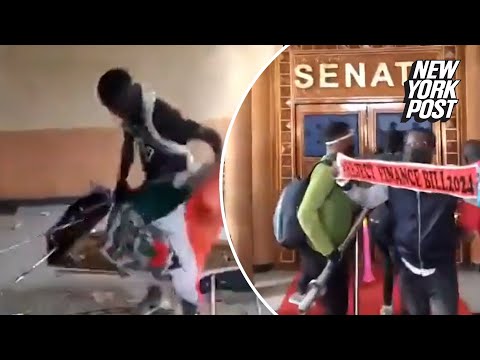 Kenya’s parliament building ablaze as thousands of protesters enter, police open fire