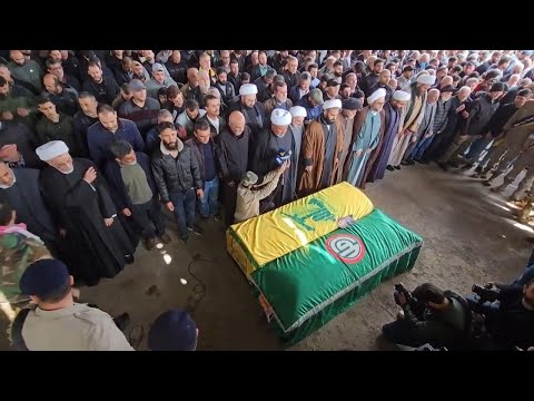 Funeral for woman and child killed in Israeli strike