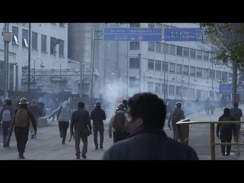 March led by Bolivian leader Evo Morales ends in clashes as it enters capital La Paz