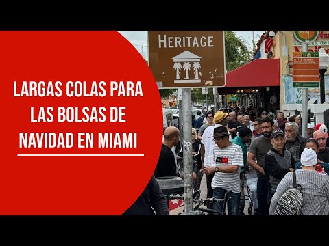 Cuadras de cola en La Pequeña Habana de Miami para recoger las tradicionales bolsas de Navidad