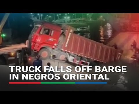 Truck falls off barge in Negros Oriental | ABS-CBN News