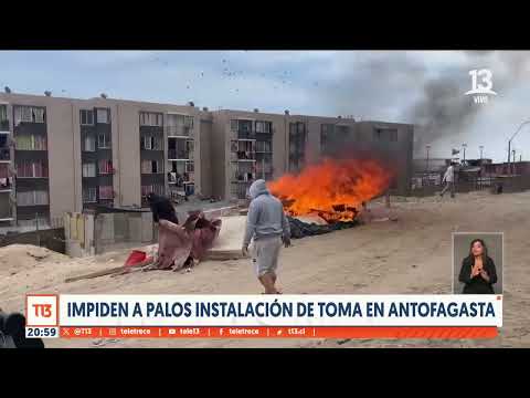 Vecinos impiden a palos instalacio?n de toma en Antofagasta