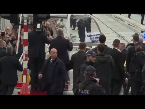 Protester against bullfighting runs out in front of popemobile during Francis' Luxembourg visit