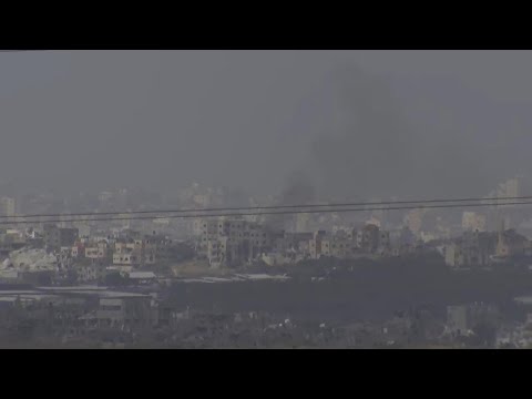 Smoke seen rising on the Gaza skyline seen from southern Israel