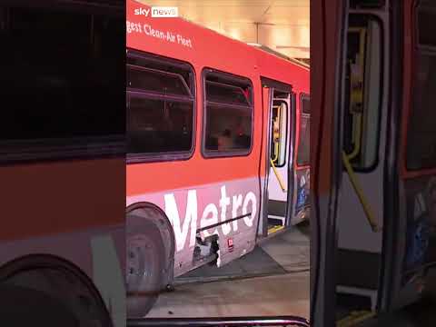 Hijacked bus slams into cars then crashes into hotel