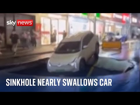 China: Sewage-filled sinkhole nearly claims car in Shanghai