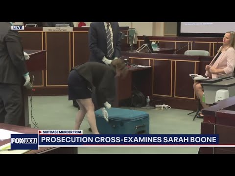 Sarah Boone closes suitcase in front of jury