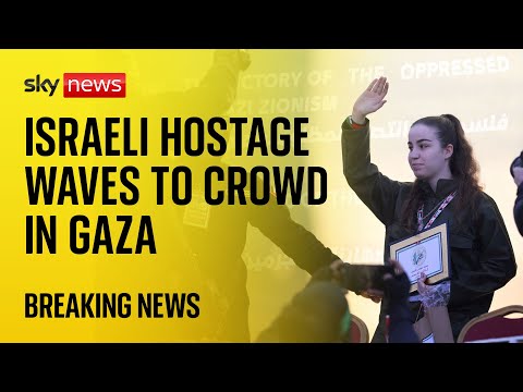 BREAKING: Israeli hostage waves to crowd as Hamas hands her over to Red Cross
