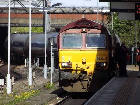 66054 leaves Nottingham with a train of Oil Tanks 12/05/2021