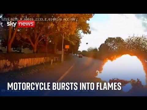 Dashcam footage shows moment motorcyclist crashes into car causing 'large fireball'