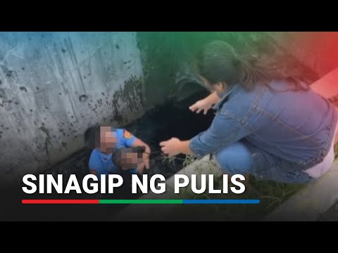 Batang nahulog sa drainage canal, sinagip ng pulis