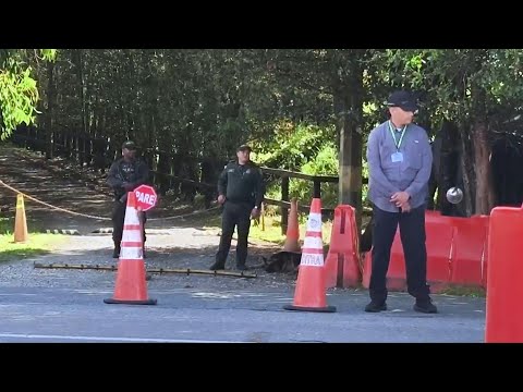 Images of police officers outside Colombian ex-president Uribe's house | AFP