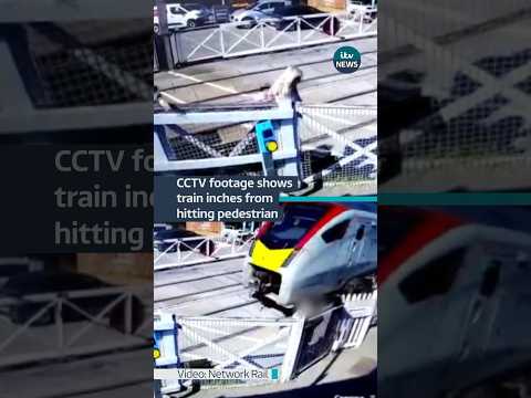 Shocking footage shows pedestrians running across a level crossing #itvnews #train #essex