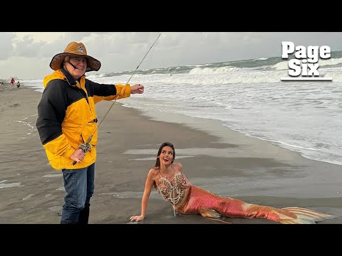 Bill Belichick, 72, hooks girlfriend Jordon Hudson, 24, as a mermaid on the beach for Halloween