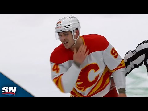 Brayden Pachal Lays Out Andre Burakovsky Before Dropping Gloves with Jared McCann