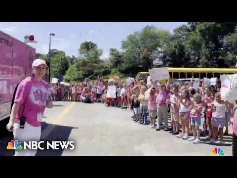 Elementary school students and staff surprise assistant principal battling cancer