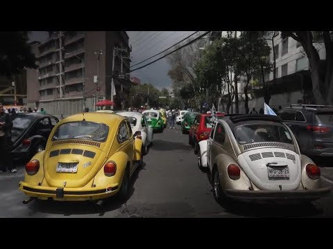 Enthusiasts in Mexico City mark International Volkswagen Beetle Day with parade