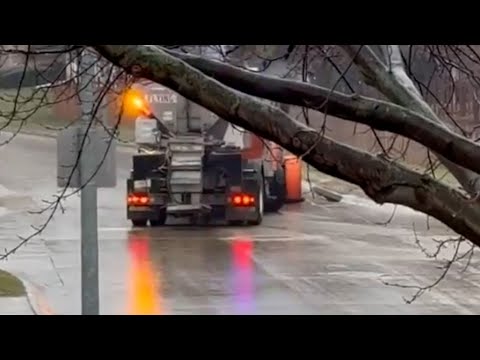 Sand truck slips and slides up icy hill in Nebraska after region hit with freezing rain