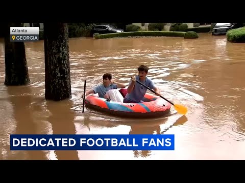 Football fan uses raft to rescue friend from Hurricane Helene flooding to go to Georgia-Alabama game