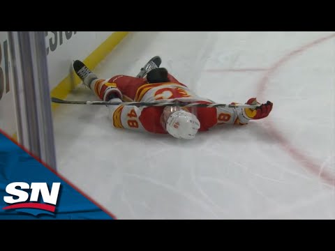 Flames Dennis Gilbert Takes A Brutal Fall After A Slew Foot From Predators Philip Tomasino
