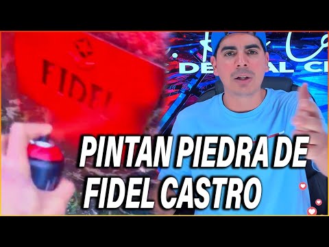 CON UN SPRAY DE PINTURA EL CUBANO PINTA TODA LA PIEDRA Y PONE FRASES EN LA EMBAJADA DE DINAMARCA !!!