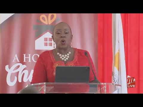 Minister of Housing & Urban Development, Camille Robinson Regis, speaking at key distribution event,