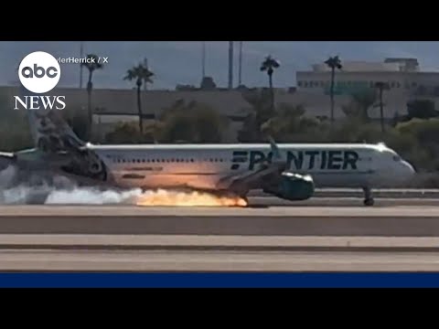 Flames erupt from Frontier Airlines plane after hard landing in Las Vegas