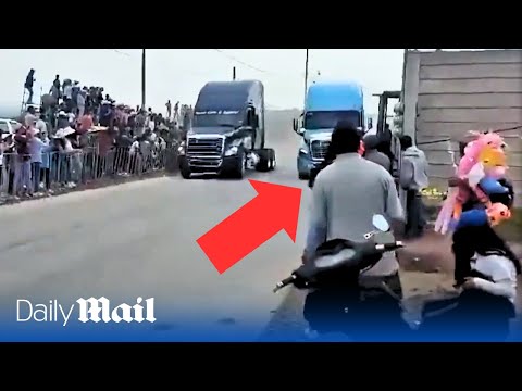 Terrifying moment truck plows into spectators during illegal street race in Mexico killing three