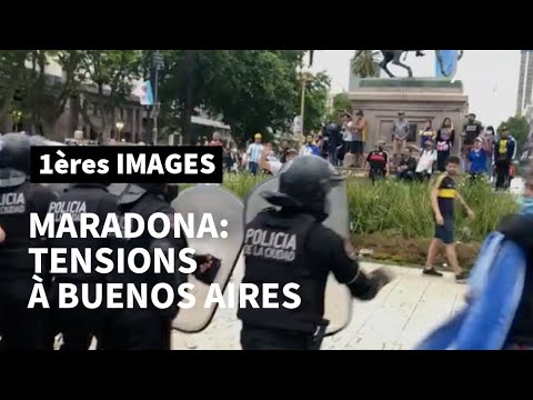 Tensions entre la police et les supporters de Maradona devant le palais présidentiel | AFP Images