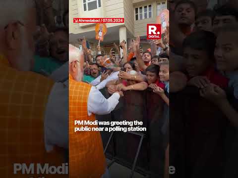 Elderly Lady Ties Rakhi To PM Modi As He Greets Public After Casting His Vote In Ahmedabad